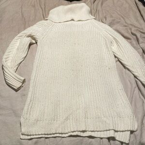 White turtleneck sweater